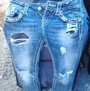 Distressed Blue Jeans with Rhinestone Accents